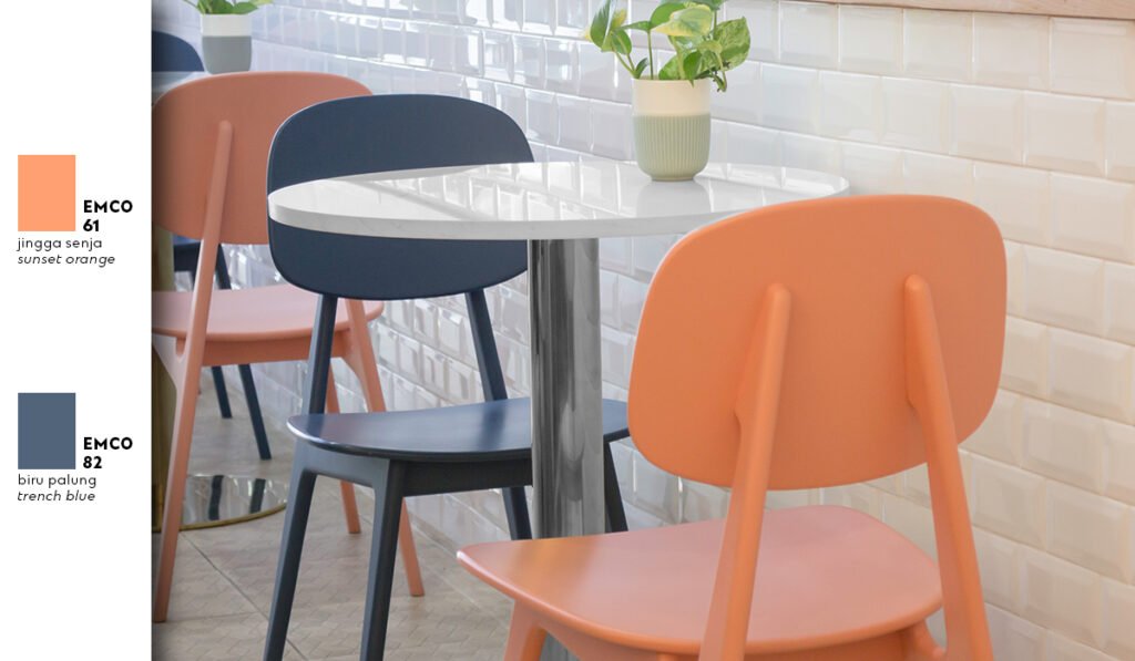 Aesthetic white tables and warm-colored wooden chairs